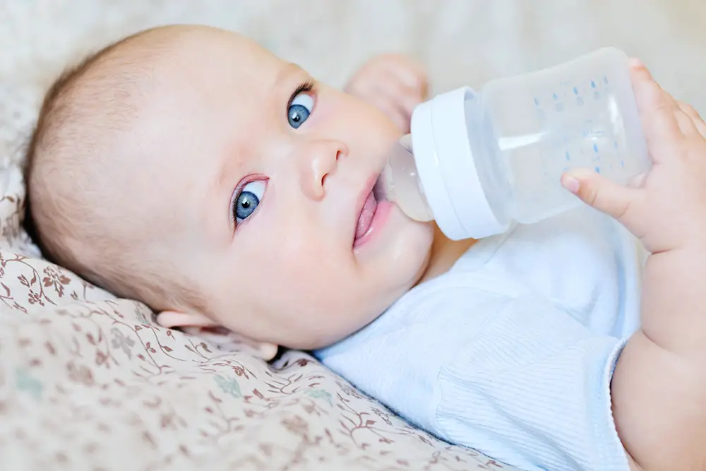 How To Teach Baby To Hold Bottle